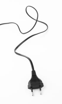 Black electrical plug and electrical cord on white background 