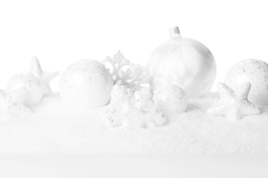 Christmas card with beautiful white decorations in snow