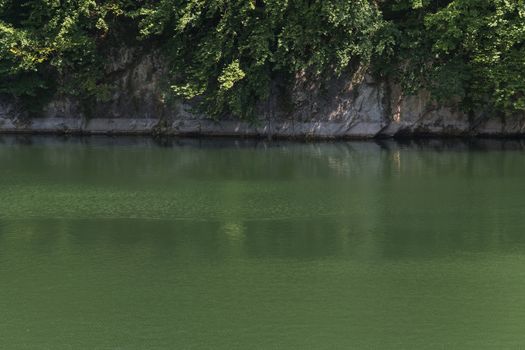 Lake with banks on the site of a former quarry for the extraction of limestone