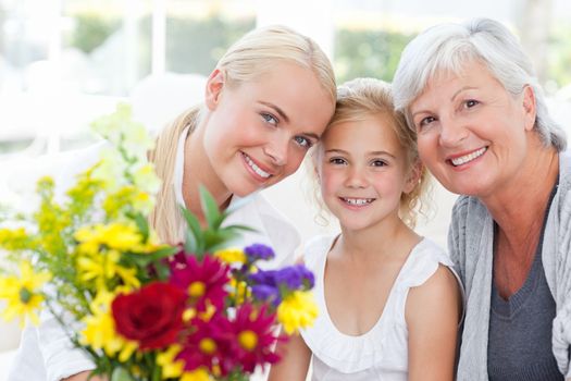 Radiant family with flowers at home