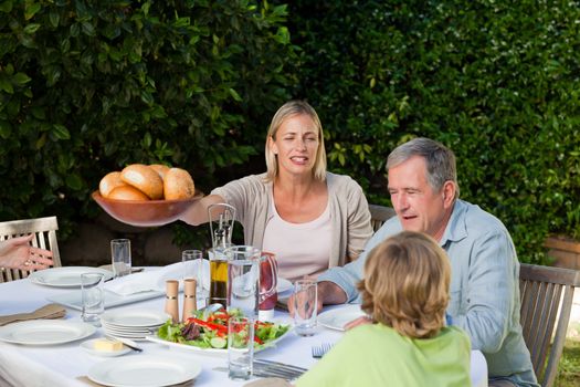 Family eating in the garden