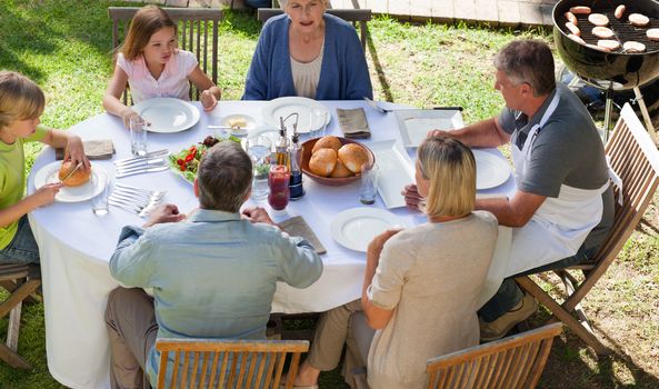 Family eating in the garden