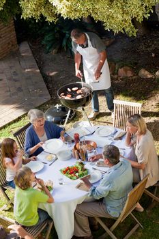 Family eating in the garden