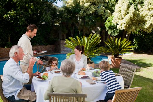 Family eating in the garden