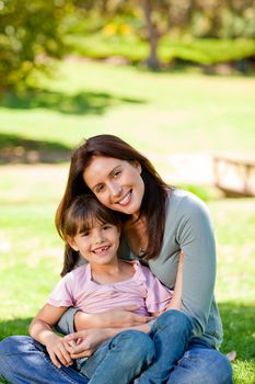 Happy mother with her daughter in the park