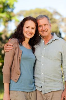 Woman with her fatherin-law in the park