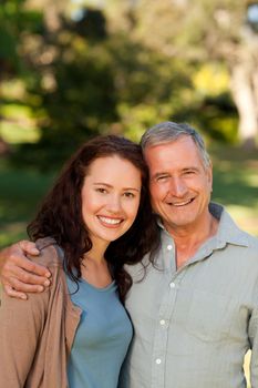 Woman with her fatherin-law in the park