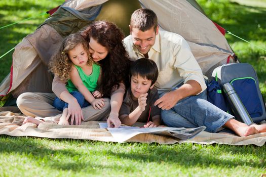 Joyful family camping