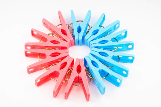 Clothespin clips on isolated white background
