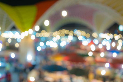 Blur lights from Ao-udom plaza with colorful umbrella