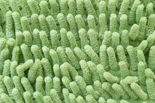 Macro green cleaning doormat or carpet