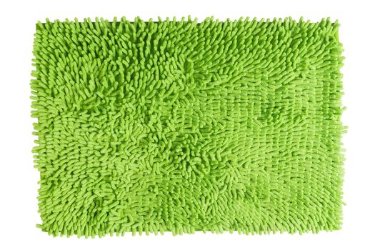 Men foot with shoe on green doormat