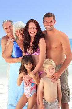 Portrait of a joyful family at the beach