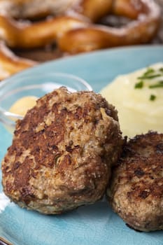 two bavarian meat loafs on a plate