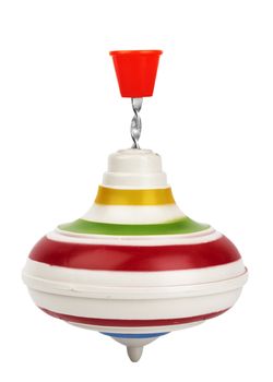 Aging plastic nursery whirligig with red handle on white background 