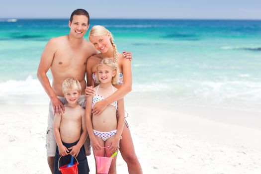 Radiant family on the beach