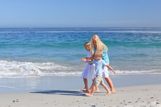 Family walking on the beach