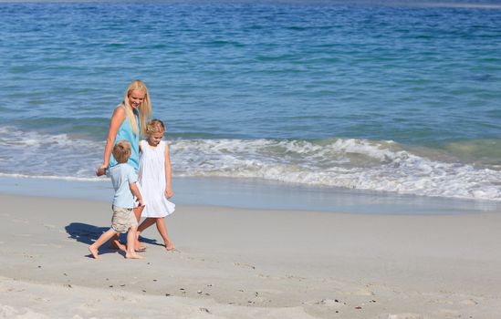 Family walking on the beach