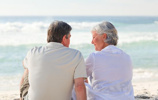 Senior couple looking at the sea