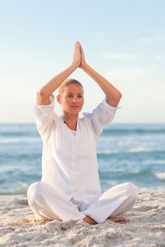 Peaceful woman practicing yoga 