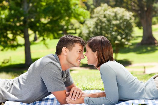 Couple in the park during the summer