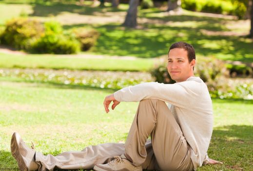 Handsome man during the summer in the park