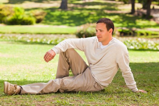 Handsome man in the park during the summer 