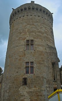 High round stone tower at medieval fortress