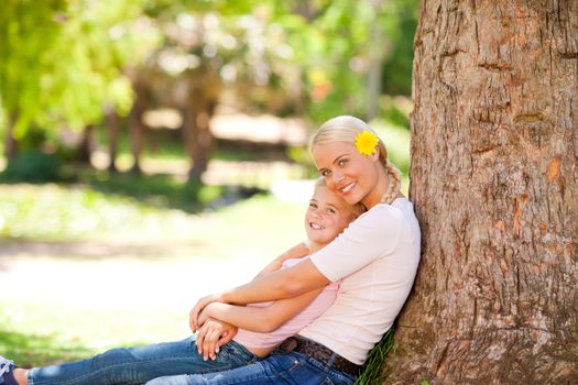 Lovely mother with her daughter during the summer 