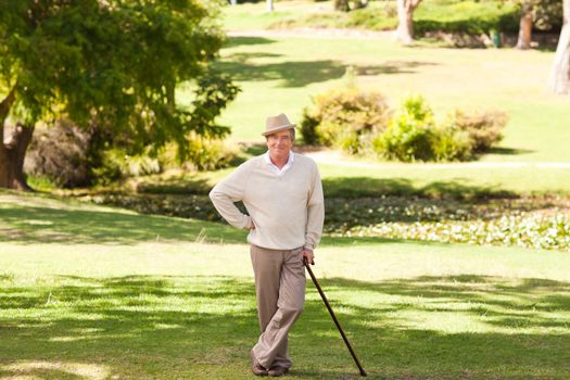 Senior man posing in front of the camera during the summer