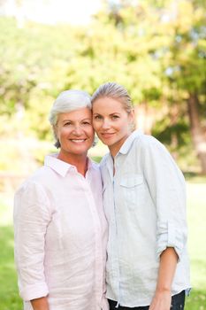 Mature mother with her daughter during the summer