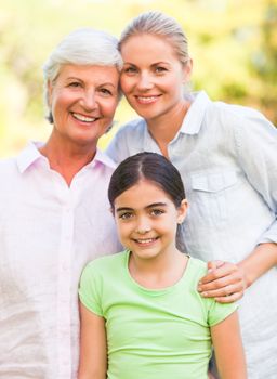 Adorable family in the park during the summer 