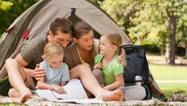 Family camping in the park during the summer