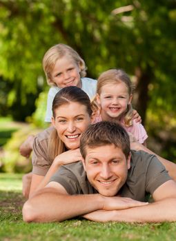 Lovely family in the park during the summer