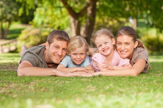 Lovely family in the park during the summer