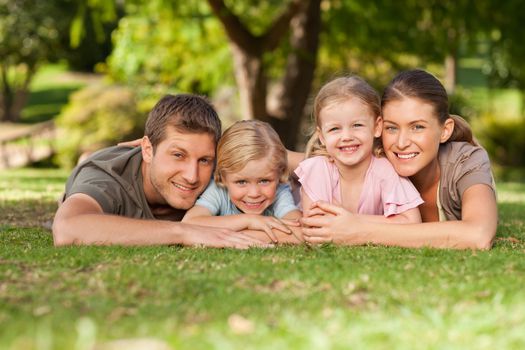 Lovely family in the park during the summer