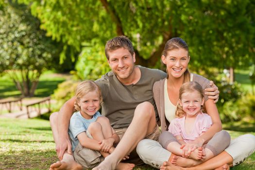 Lovely family in the park during the summer