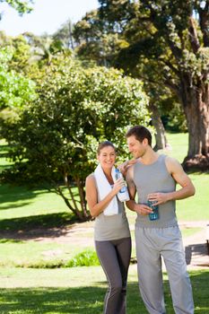 Sporty lovers in the park during the summer