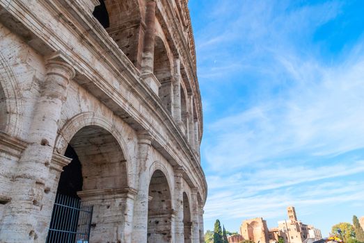 Colosseum in Rome, Italy. Ancient Roman Colosseum is one of the main tourist attractions in Europe. People visit the famous Colosseum in Roma center.