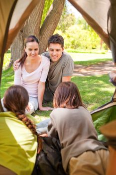 Family camping in the park during the summer