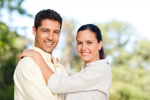 Lovely couple in the park during the summer