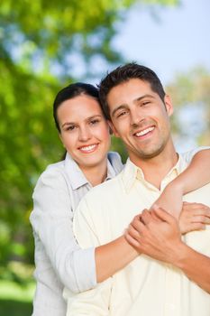 Lovely couple in the park during the summer