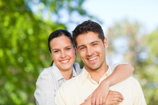 Lovely couple in the park during the summer