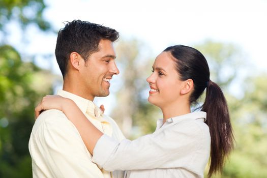 Lovely couple in the park during the summer