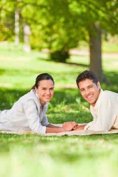 Lovely couple in the park during the summer