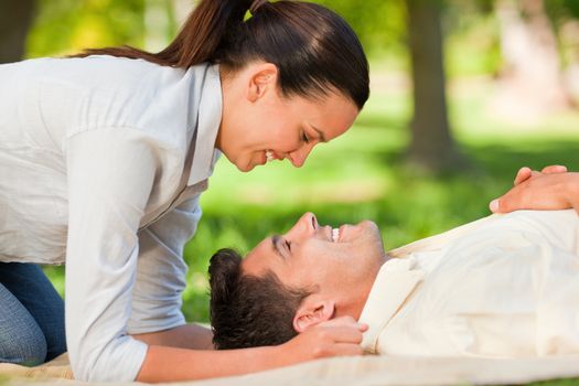 Lovely couple in the park during the summer