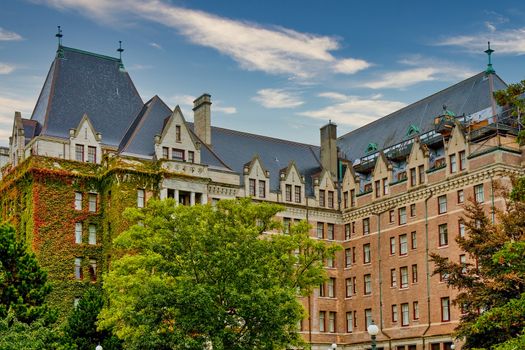 A grand old ivy covered brick hotel