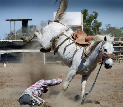 A horde rider during his training fall down from the running horse. This image was taken on June 2017, at Dallas Texas, USA.