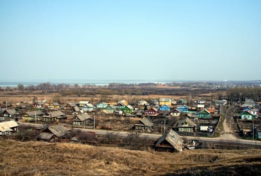 Spring landscape - small village in early spring, panoramic view of the russian village
