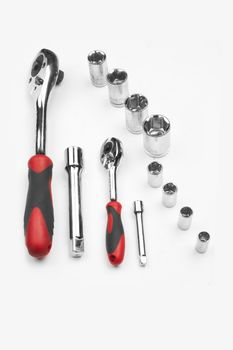 kit of metallic tools on white background    